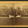 View of main Conservatory with employees working.