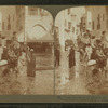 Picturesque natives of Egypt in the crooked streets of "Cairo," World's Fair, St. Louis.