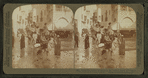 Picturesque natives of Egypt in the crooked streets of "Cairo," World's Fair, St. Louis.