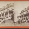 Group of hotel guests on the porch and balcony.