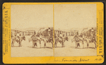 Burros and people on San Francisco Street.