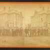 Group portrait in front of an office building.