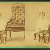 Little boy sitting in a chair.