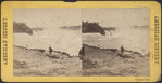 Man standing near top of Horseshoe Falls.