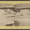 View of falls with ice and snow.