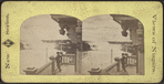 General view, Niagara Falls. [Man standing on balcony above falls.]