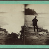 Niagara Falls.[View of man standing on the bank looking down at the falls.]