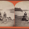 Tourists posing at Niagara Falls.