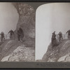 An Old Niagara Guide, looking into the awe-inspiring Cave of the Winds, Niagara Falls, U.S.A.