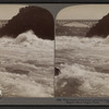 Wild waters of the Great Lakes in Whirpool Rapids hurrying seaward (north) in below Niagara Falls.