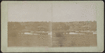 View of homes in the mountains, and lake.