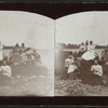 Group of men and women at the beach.