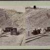 Women and children waiting near the railroad tracks, Otisville.