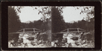 Rustic Bridge with river below.