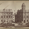 View of a bank building with clock tower.