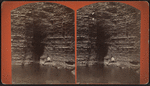 View of the man sitting by the pond.