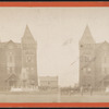 Large group gathered in front of building.