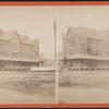 View of building, grounds under construction.