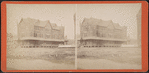 View of building, grounds under construction.