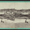 Logs washed over the dam, west side of the bridge, Glens Falls, N.Y.
