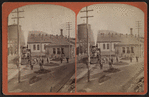 Erie Railroad yard showing locomotive, watertower.