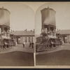Erie Railroad yard showing locomotive and watertower.