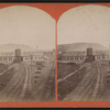 Erie Railroad yard showing round house, watertower and switching yard.
