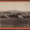 General view of Ithaca, Cayuga Lake in the distance.