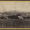 General view of Ithaca, Cayuga Lake in the distance.