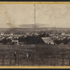 General view of Ithaca, Cayuga Lake in the distance.