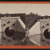 View of a culvert possibly beneath the Erie Canal, with reflection