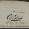 View of locks, showing a boat locking through, Lockport, N.Y.