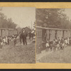 Men standing by railway cars.