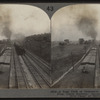 A Busy Path of Commerce in Central New York - Four Track Railway. Electric Road at right, Erie Canal at extreme left.