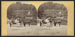 Sharon Springs, N.Y. [View of women on horse-drawn carts. Magnesia Temple in background.]