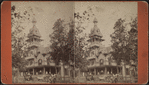 Residential building, people gathered on porch, horse-drawn carriage in foreground.