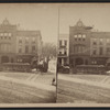 Trojan hooks. [Showing a fire ladder in front of Curley's hotel and restaurant.]