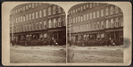 View of Barnard & Sons, and other stores in Utica.