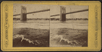 Brooklyn Bridge, New York. (Taken from ferry boat under full headway.)
