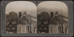 Looking Down on New York's Skyscrappers -- From Woolworth Tower (S.W.) Over Battery to Statue of Liberty and Harbor.