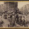 Broadway[street scene with pedestrians, carriages and shops].