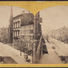 View on Fifth Avenue looking down[view of townhouses and church].