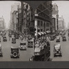 5th Avenue[street scene with automobiles and pedestrians].