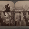 Photographing New York City - on a slender support 18 stories above pavement of Fifth Avenue[man with a camera].
