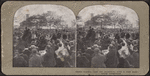 Castle Garden, now the aquarium, with a very interesting foreground [large crowd of people, some waving at a procession, in foreground].