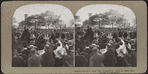 Castle Garden, now the aquarium, with a very interesting foreground [large crowd of people, some waving at a procession, in foreground].