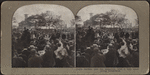 Castle Garden, now the aquarium, with a very interesting foreground [large crowd of people, some waving at a procession, in foreground].