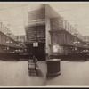 View of library with stacks and skylight.