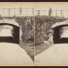 Arch covering the drive over the Walk east of the Mall.