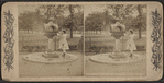 Drinking fountain, Central Park, N.Y. [Girl in a dress at the fountain.]